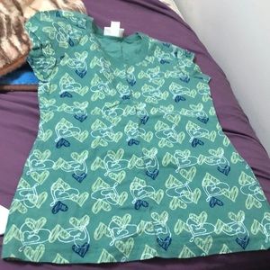 Green kids shirt with hearts.